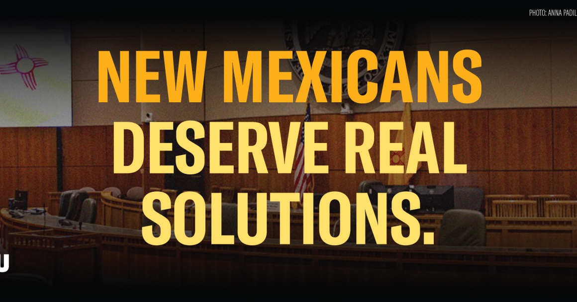 Banner image of the interior chamber of the Roundhouse with yellow text over it that reads: New Mexicans Deserve Real Solutions
