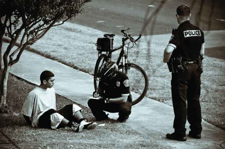 Man being arrested by police