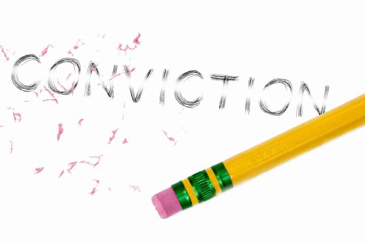 The word conviction being erased 