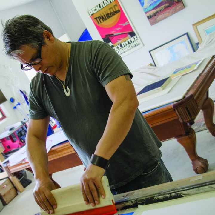 Mateo Romero working in his studio.